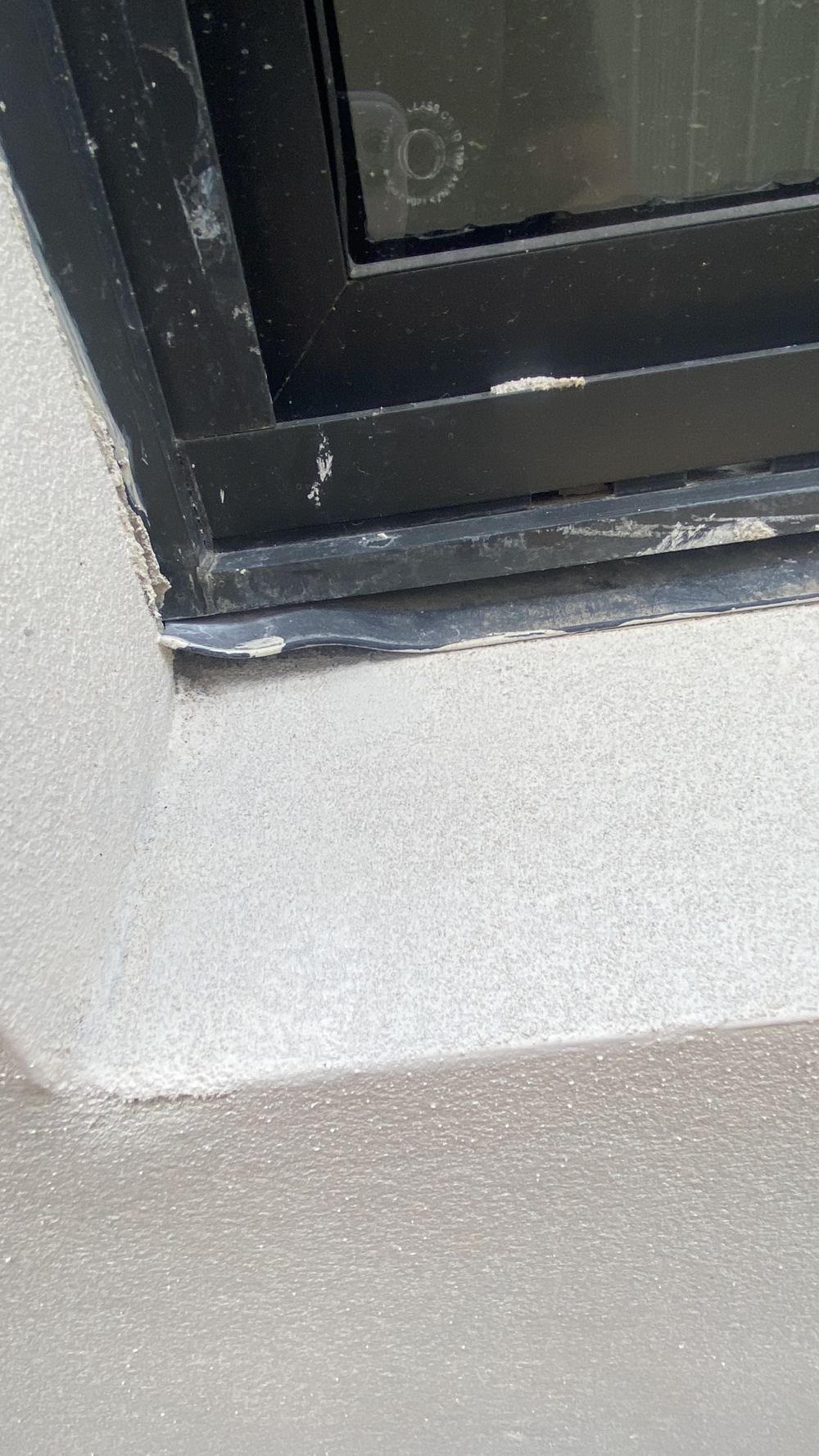 Window rubber flashings sitting out of place between frame and cladding, Tallawong